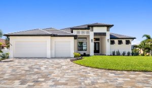 The exterior of a beautiful custom home on a sunny day.